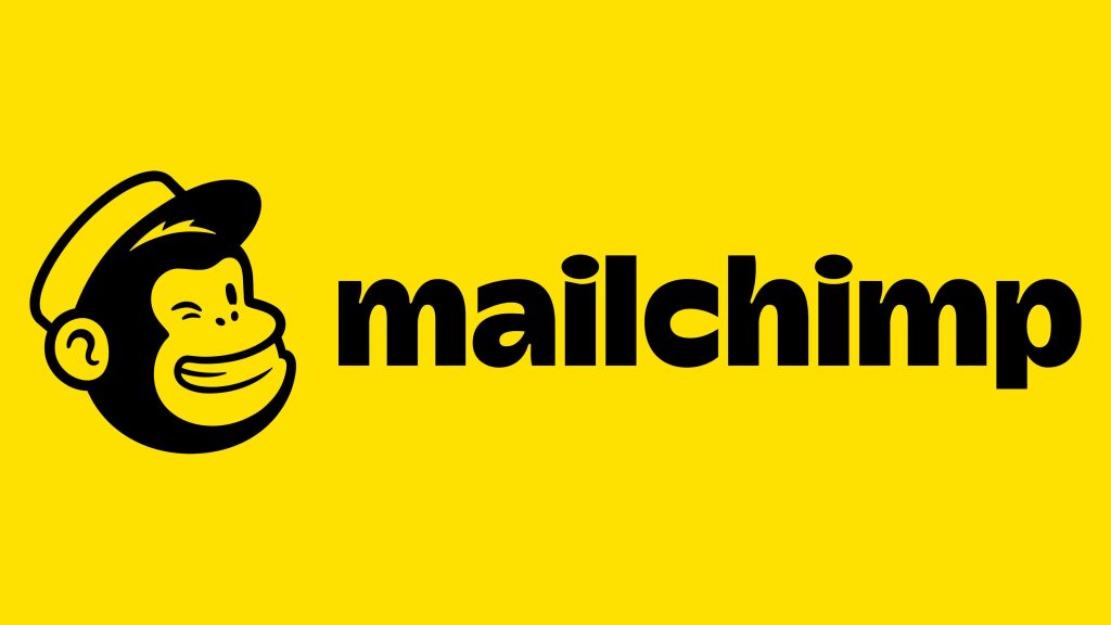 MailChimp logo featuring a smiling chimpanzee in a hat next to the bold MailChimp text on a bright yellow background.