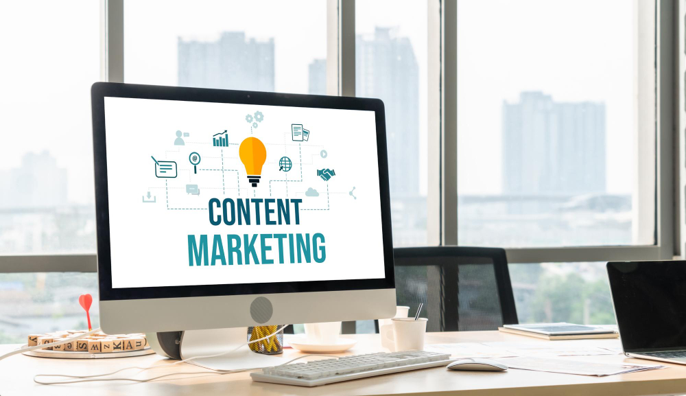 The word 'content' is positioned in the centre of a computer screen, surrounded by various icons